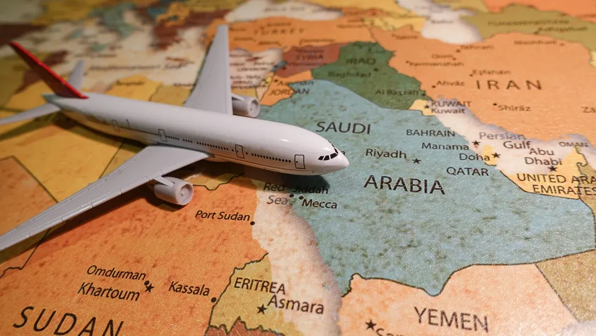 Plane on the map of the Saudi Arabia